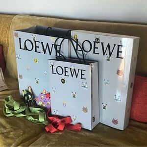 Loewe Louis Wain gift bags and gift box with cat artwork Loewe holiday packing